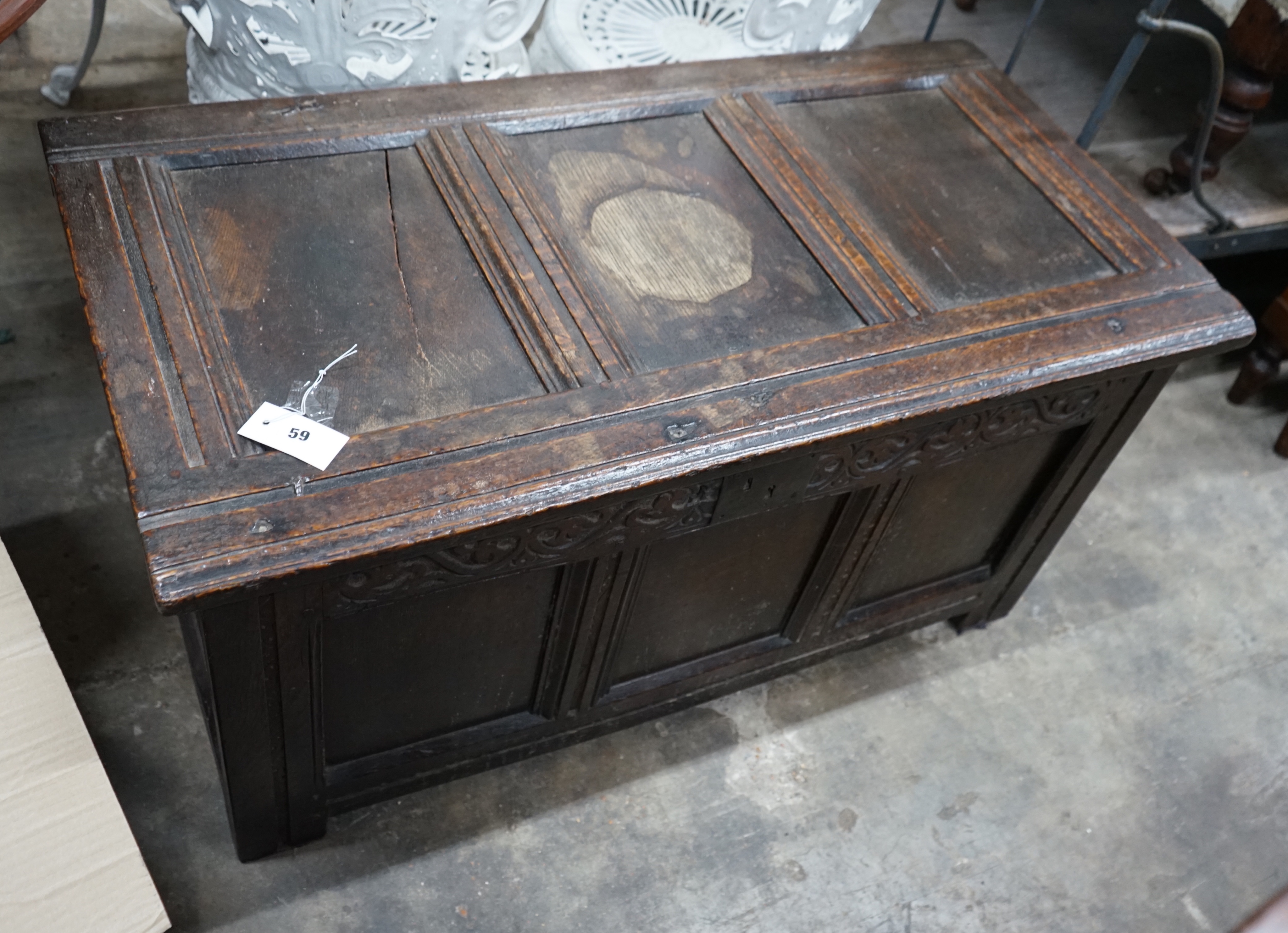 A late 17th century carved oak coffer, width 102cm depth 51cm height 50cm